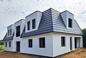 Einfamilienhaus mit vorgehängten, hinterlüfteten Putzfassaden.